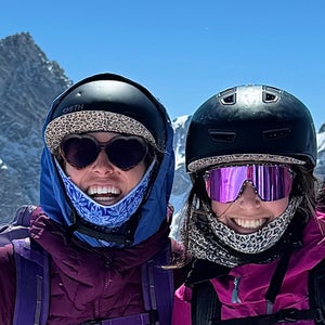 Two girls smile while wearing some of the best sunglasses we could find