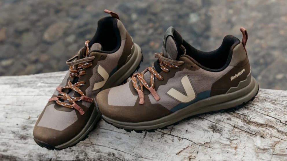 veja x finisterre hiking shoes on a rock