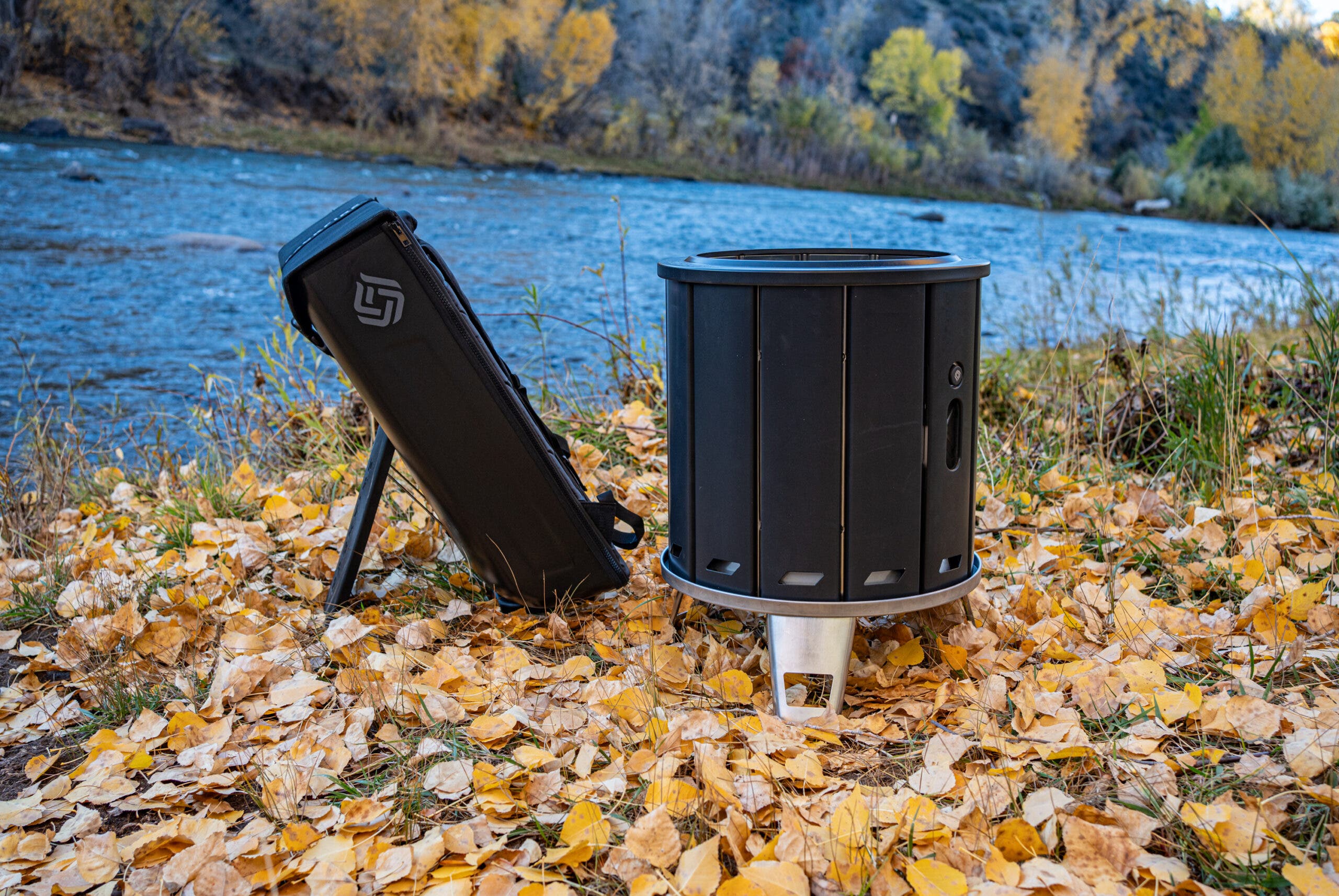 PACKFIRE fire pit next to river