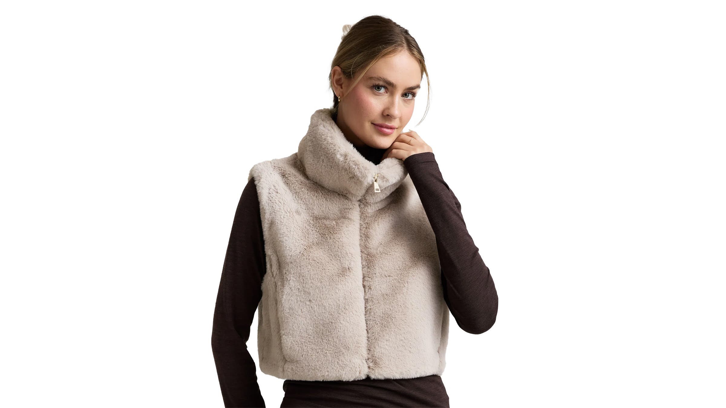 Female model wearing Beyond Yoga On The List Faux Fur women's vest on white background