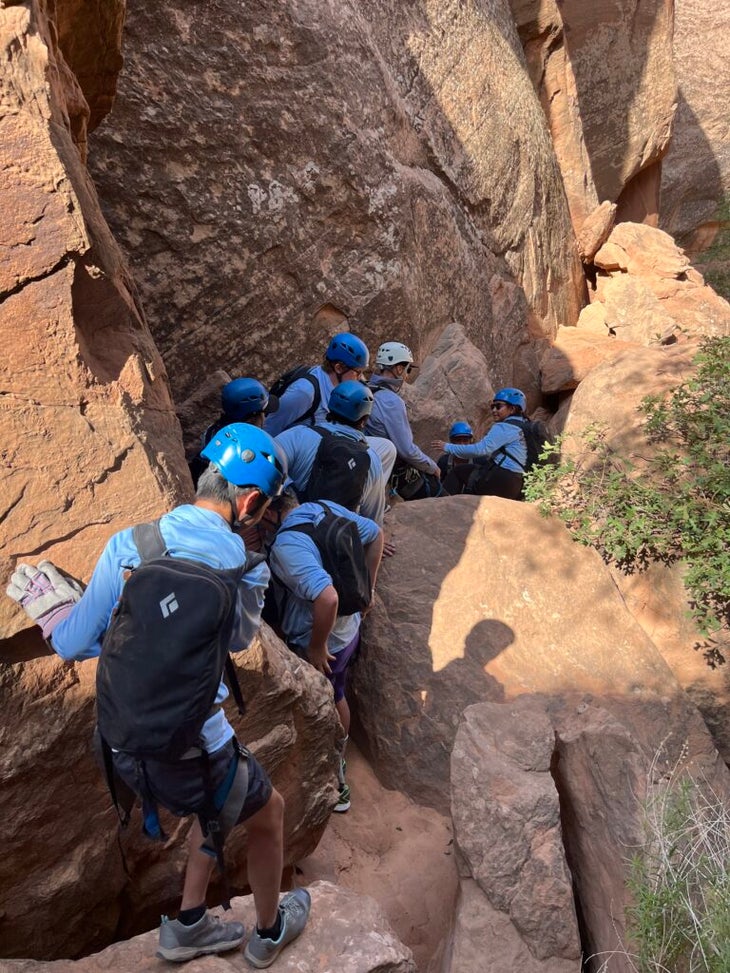 a group of people with disabilities enjoying an accessible adventure in a canyon