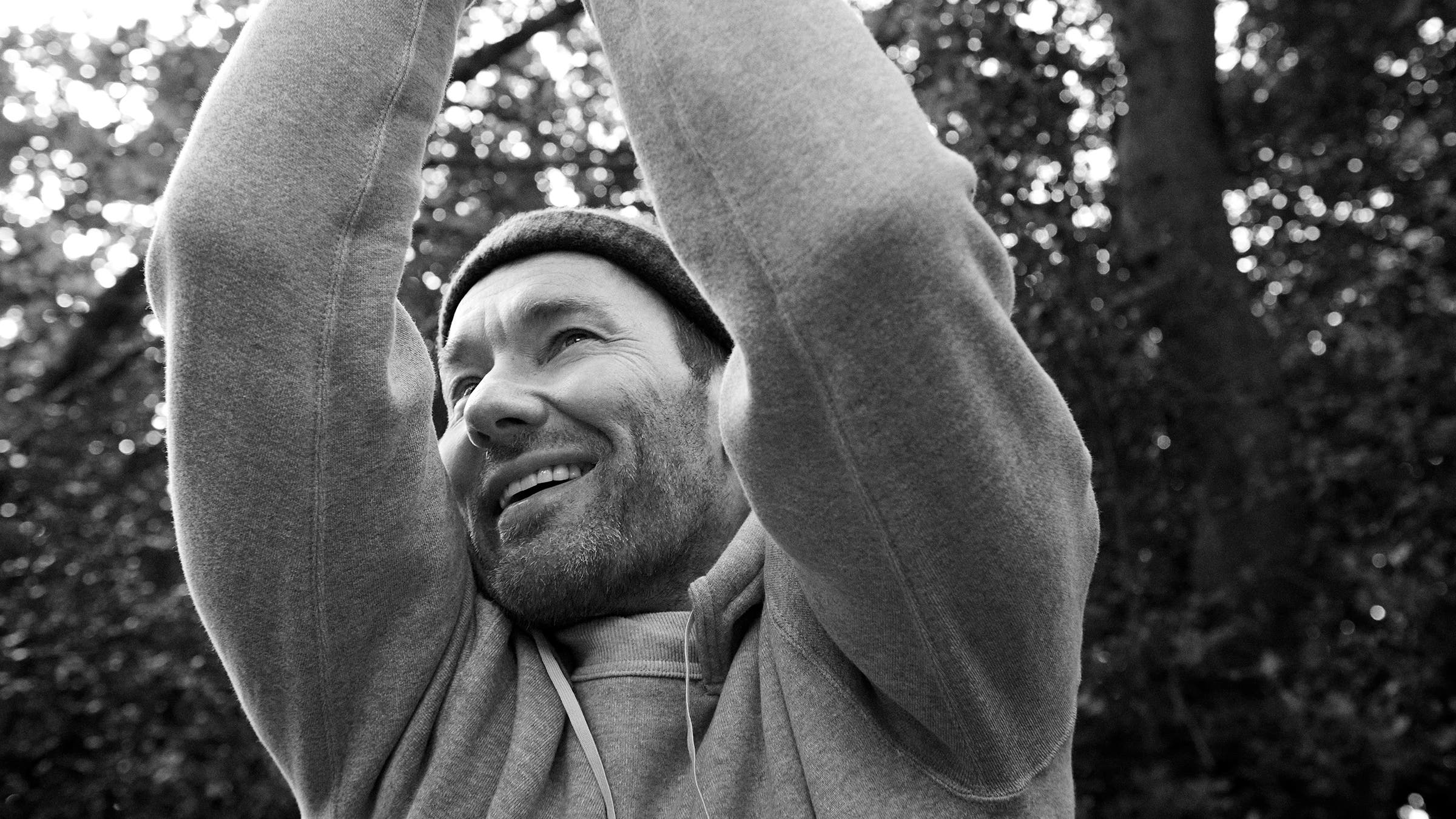 Joel wears After Hood Sweatshirt by Cushman Outside Lot. 26350 from Clutch Summer Cafe London; wool 2025 beanie his own.