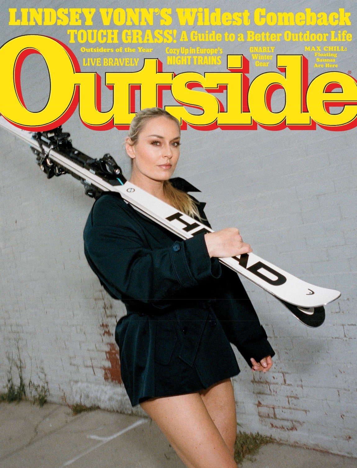 Winter 2025 cover of Outside Magazine featuring Lindsey Vonn holding a pair of skis