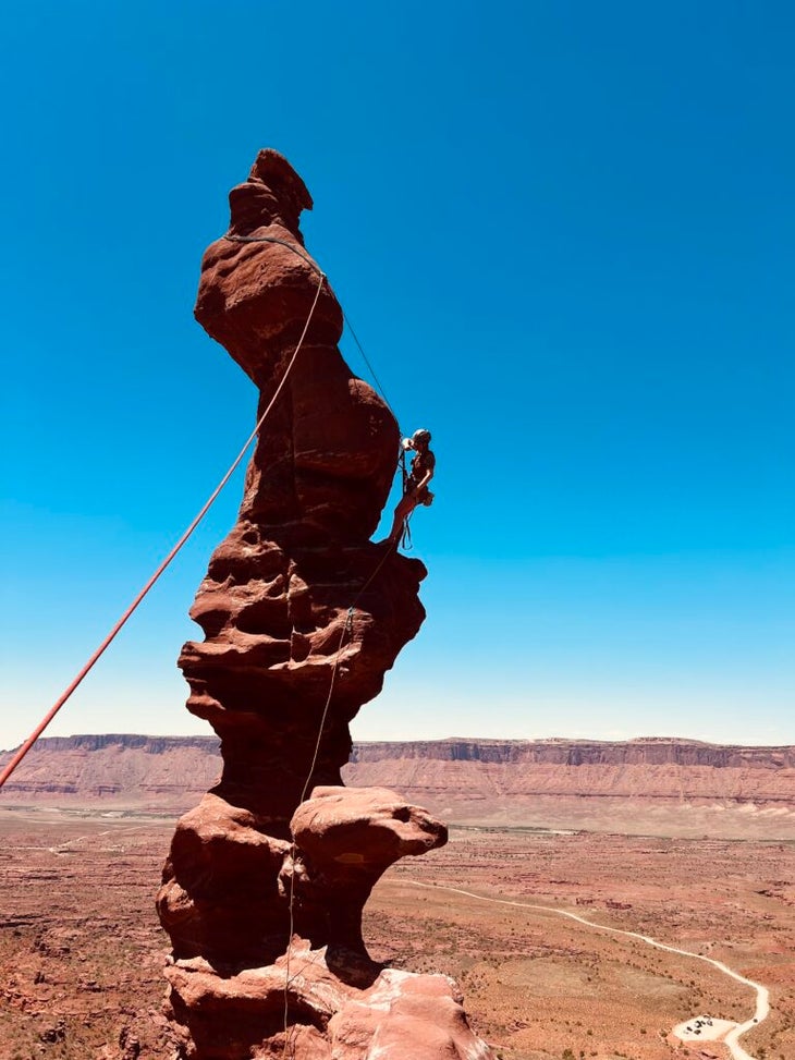 A desert tower and a climber