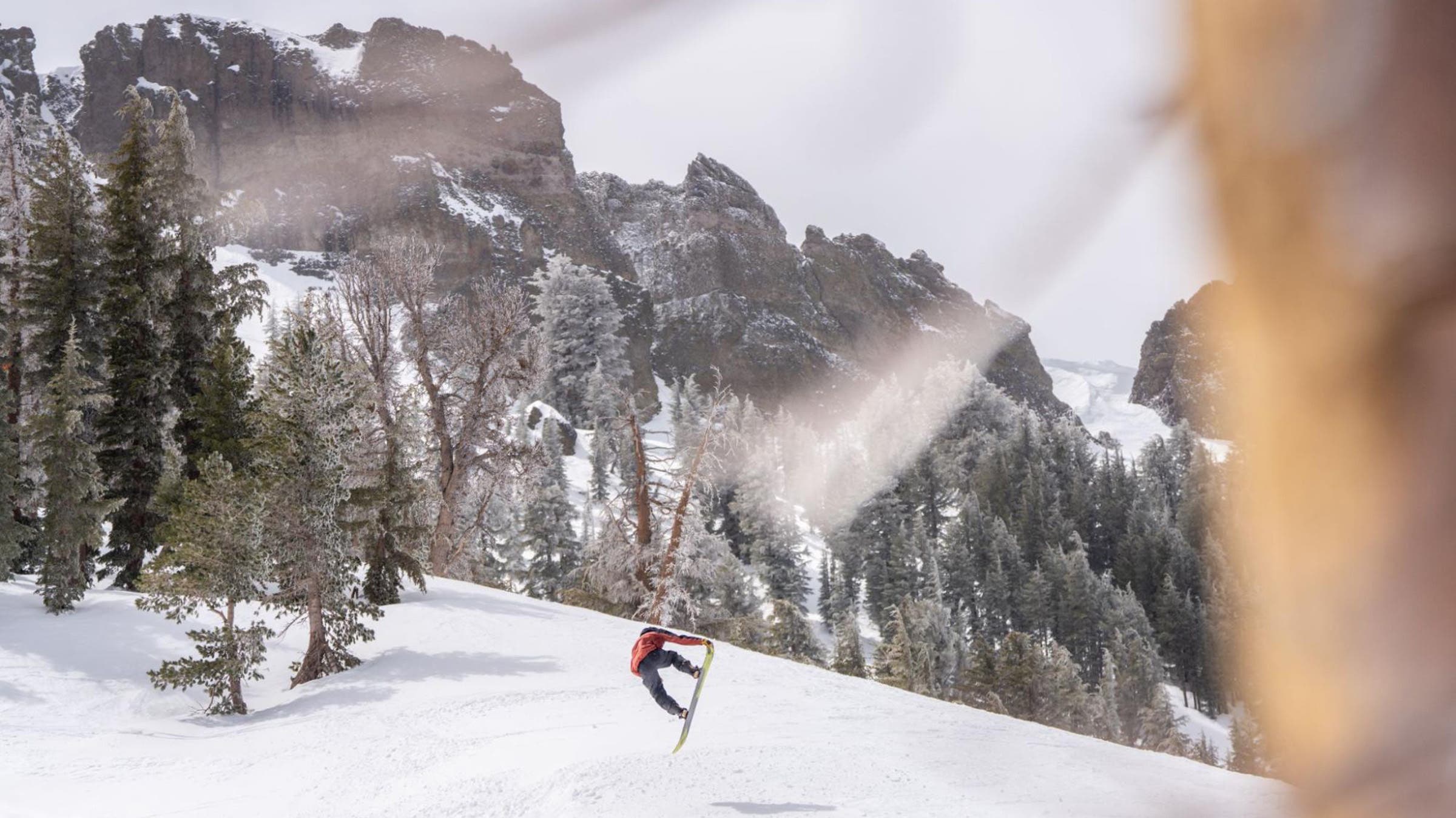 Snowboarder catches air on the Jones Howler at Kirkwood.