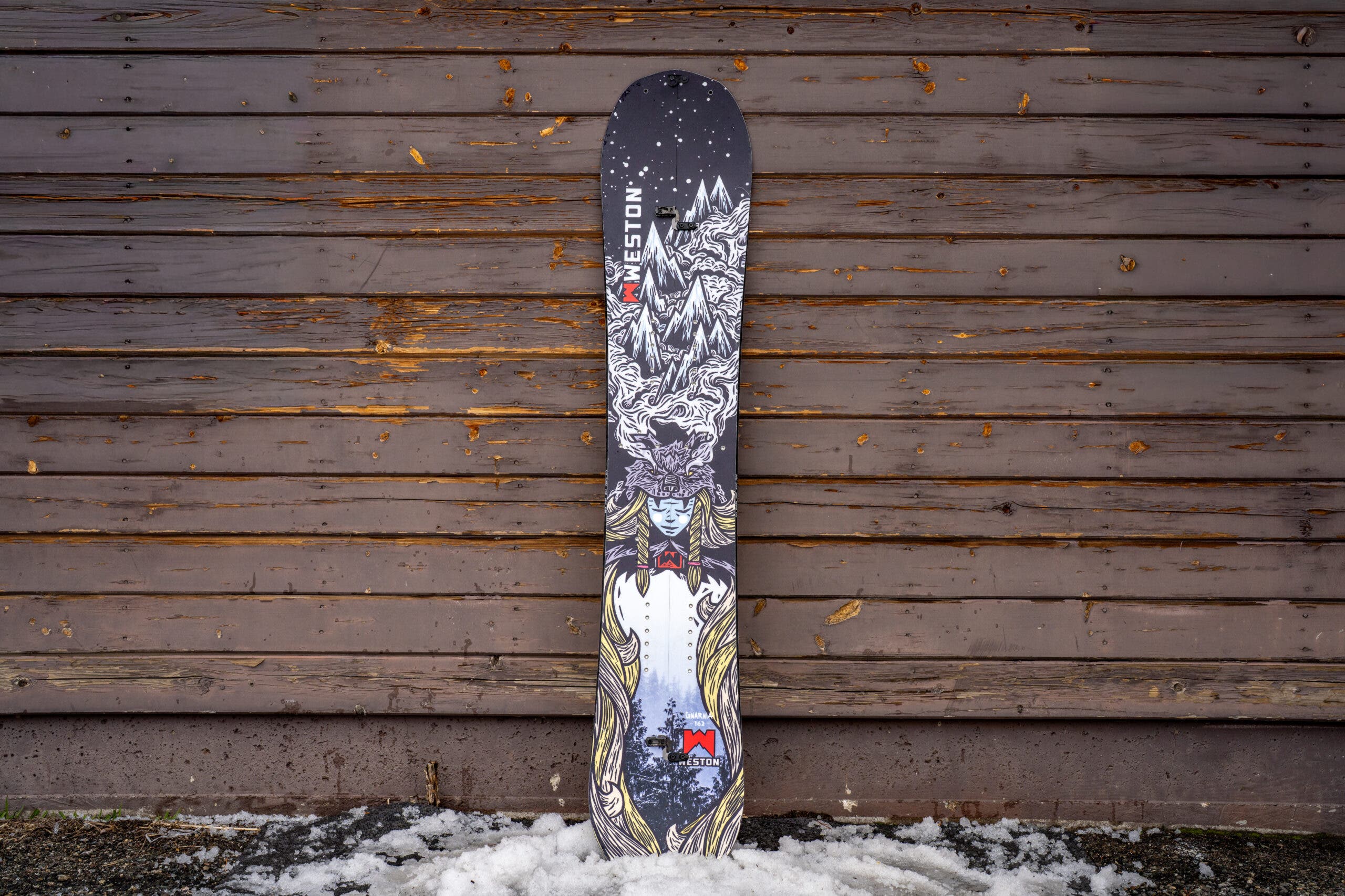 Weston Gnarnia splitboard leaning against weathered building