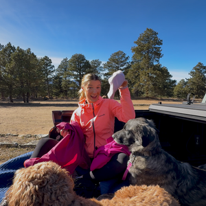 JamiLee Hoglind in truck with dogs