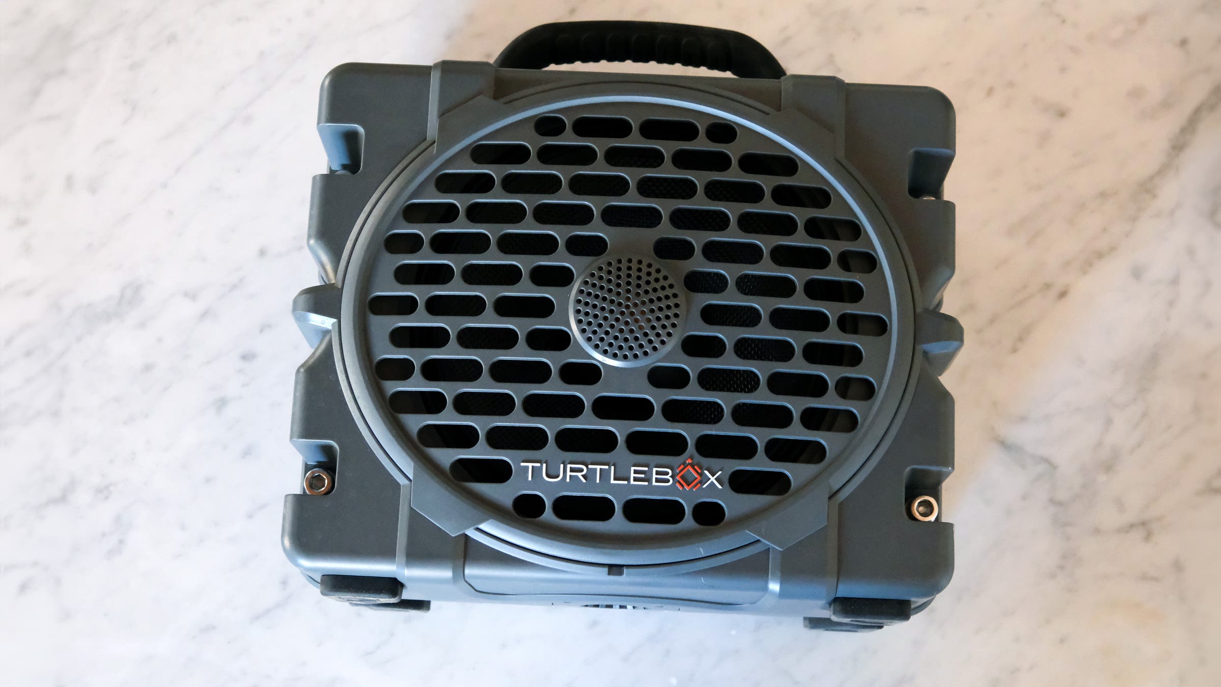 Turtlebox Grande black speaker on white counter top