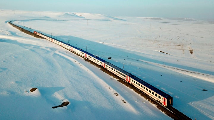 Dogu Express traveling through a snowy landscape