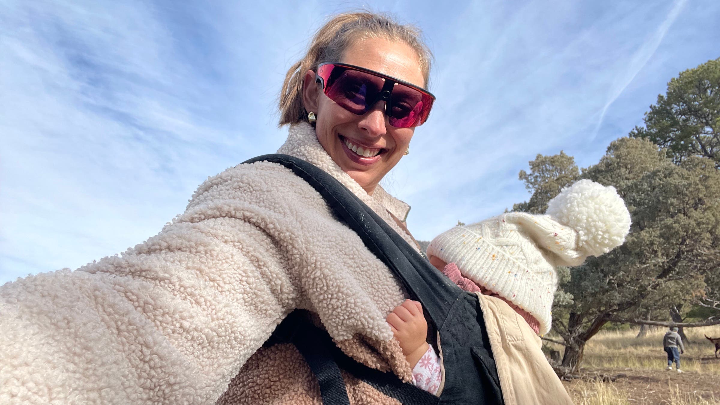 A selfie of the author on a hike with her baby