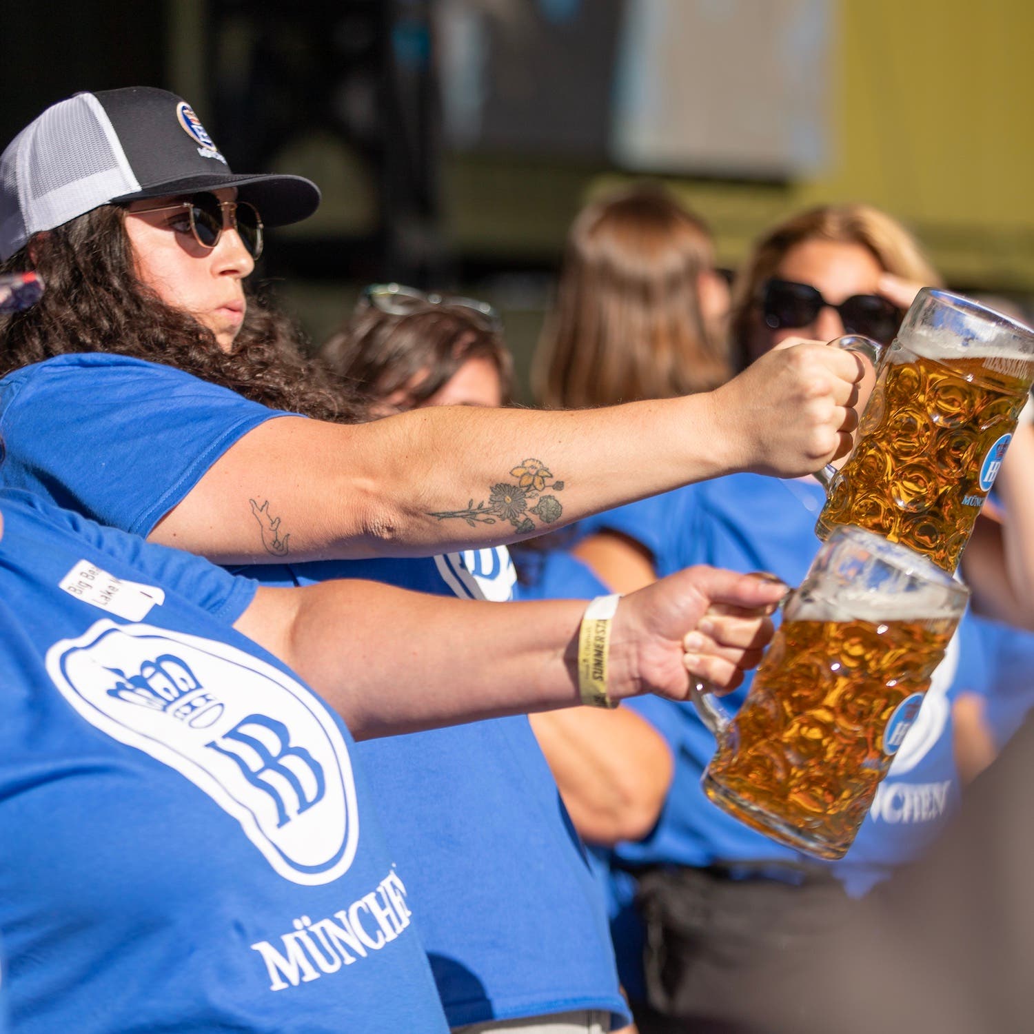 women holding beer