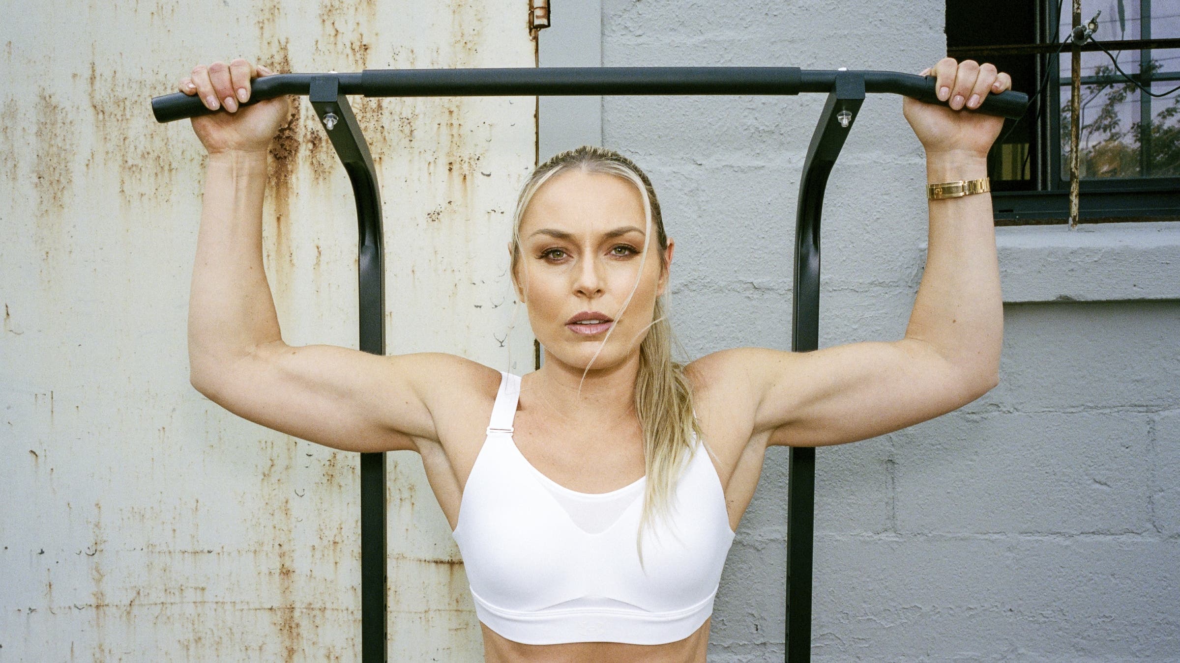 Lindsey Vonn poses with a pullup bar