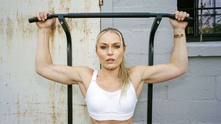 Lindsey Vonn poses with a pullup bar