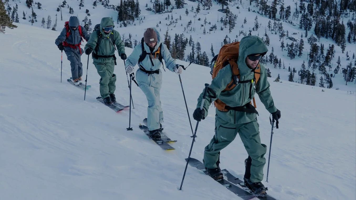 skiers going up a mountain