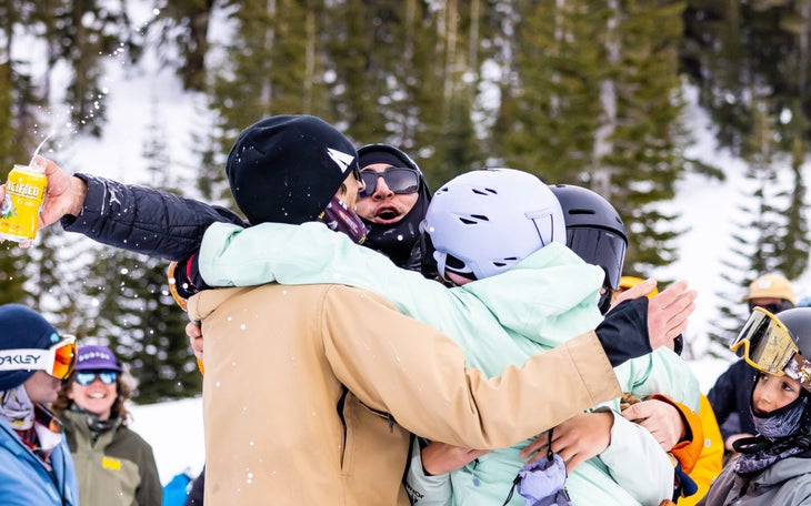 Sydney Schroder celebrates with her crew at the bottom of the 2023 IFSA four-star event. 