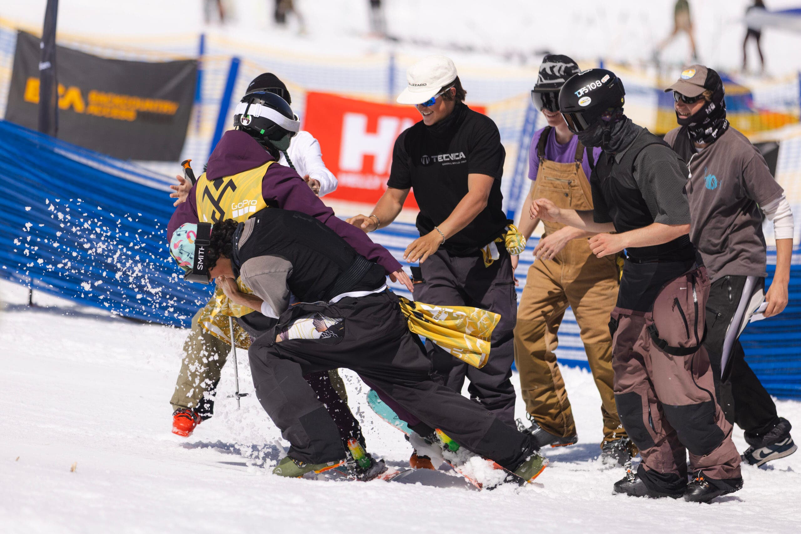 A competitor gets a hero’s welcome at the bottom of the 2025 IFSA Junior Freeride Championships.