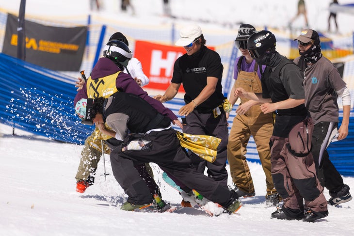 A competitor gets a hero’s welcome at the bottom of the 2025 IFSA Junior Freeride Championships.