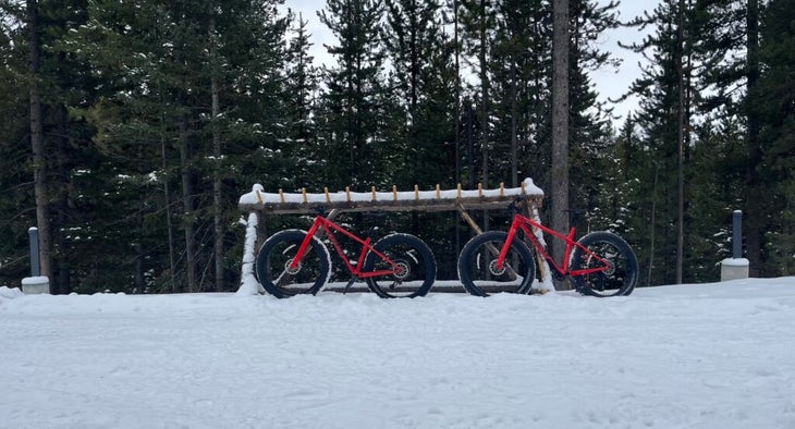 two red fat tire bikes in the snow at One&Only Moonlight Basin