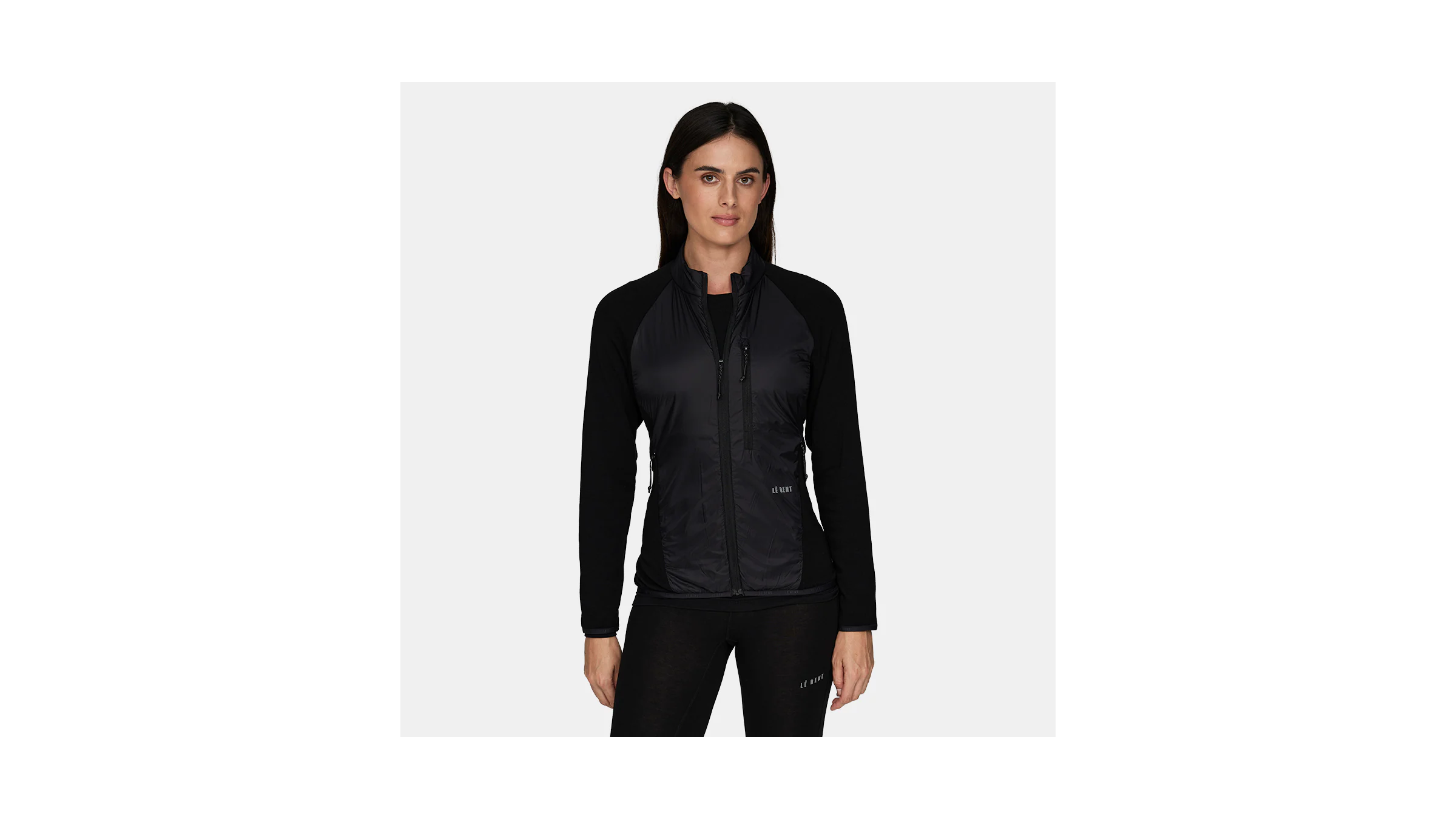 Outside's 2026 pick for the Most Versatile Winter Running Jacket, the Le Bent Alpha Active Jacket, shown on a female model in black