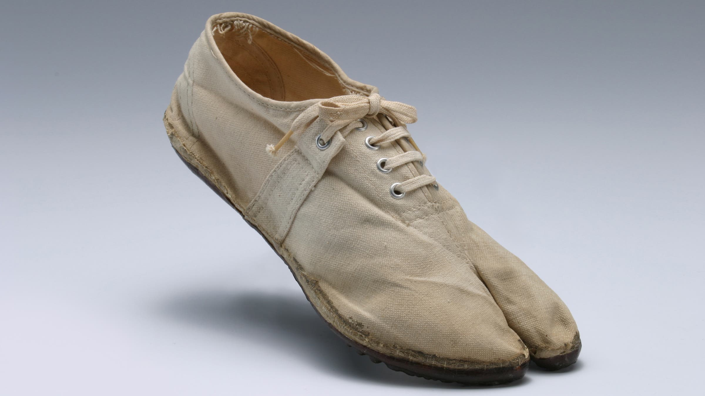 Split Toe ASICS running shoe historic