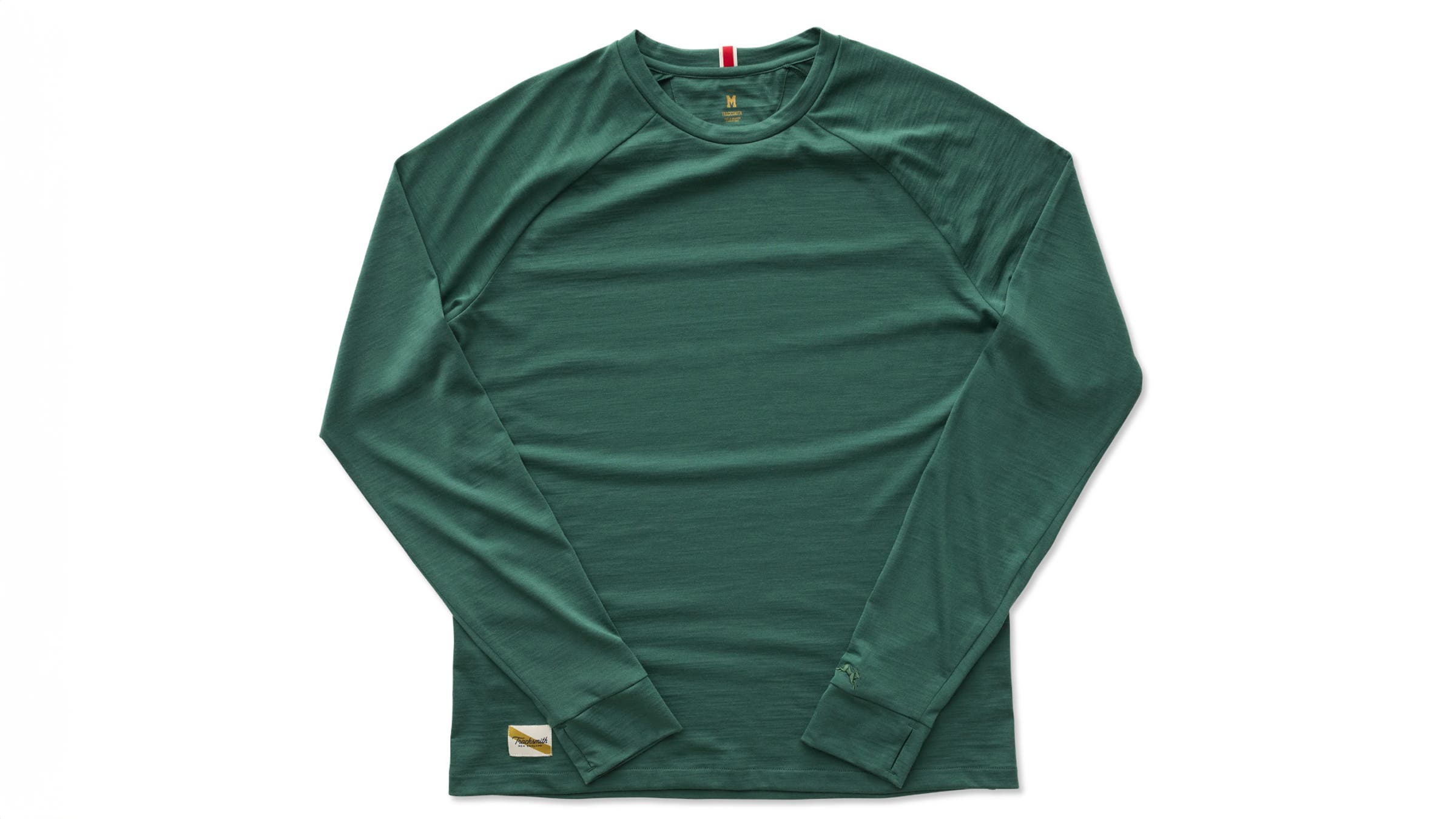 Tracksmith Harrier Long Sleeve green shirt on a white background