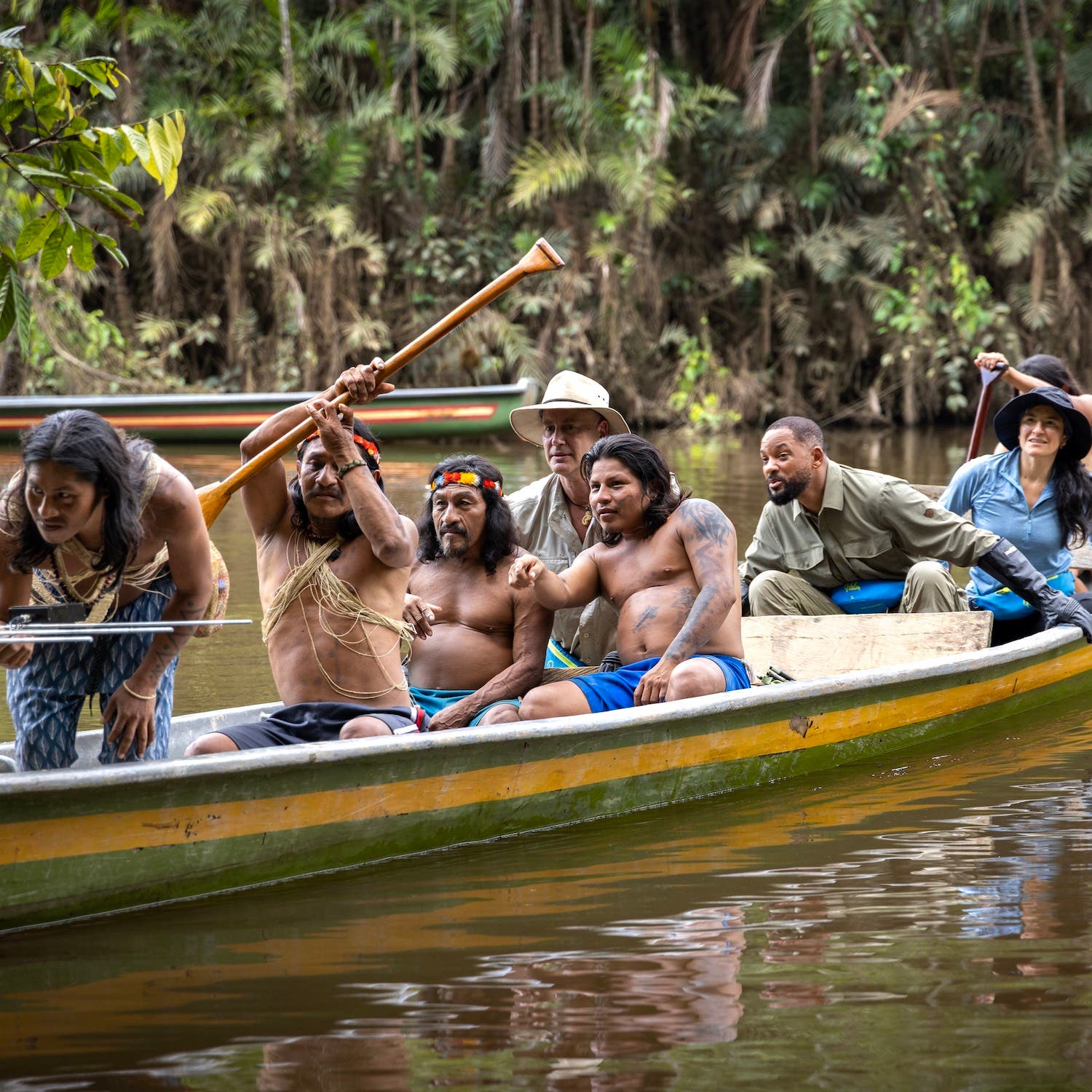 The Waorani people take Professor ofToxicology Bryan Fry, Will Smith, and Expedition Leader Carla Perez out on the water to track an anaconda to gather blood and tissue samples.