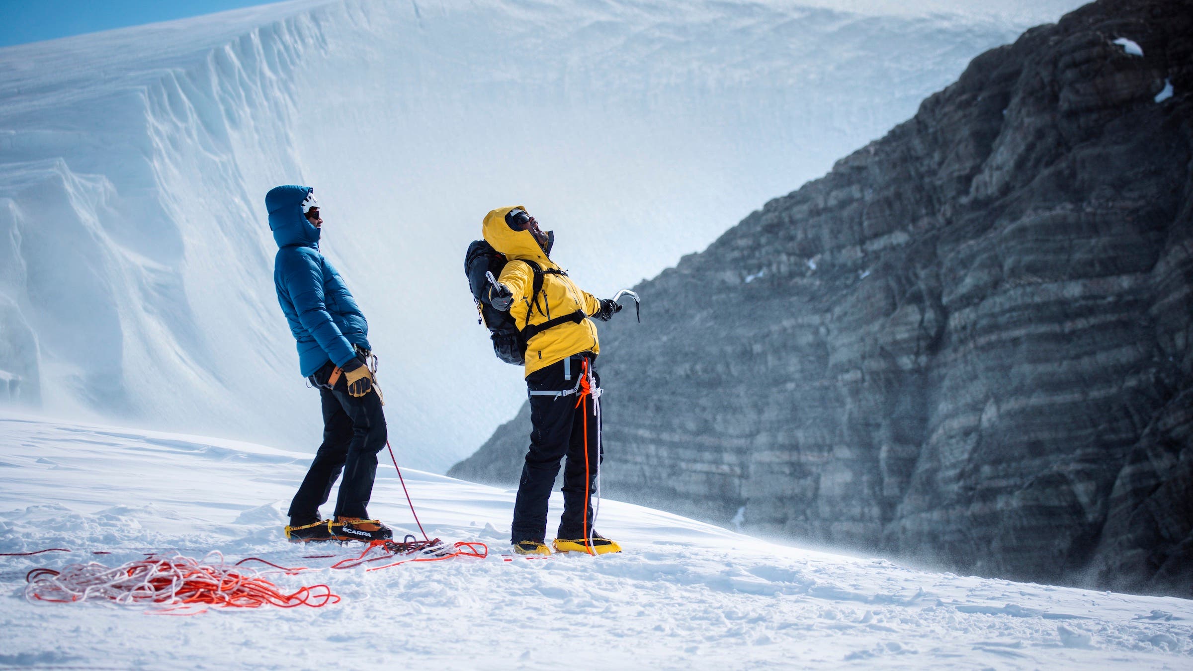 Will Smith makes it to the top of a 300-foot ice wall.
