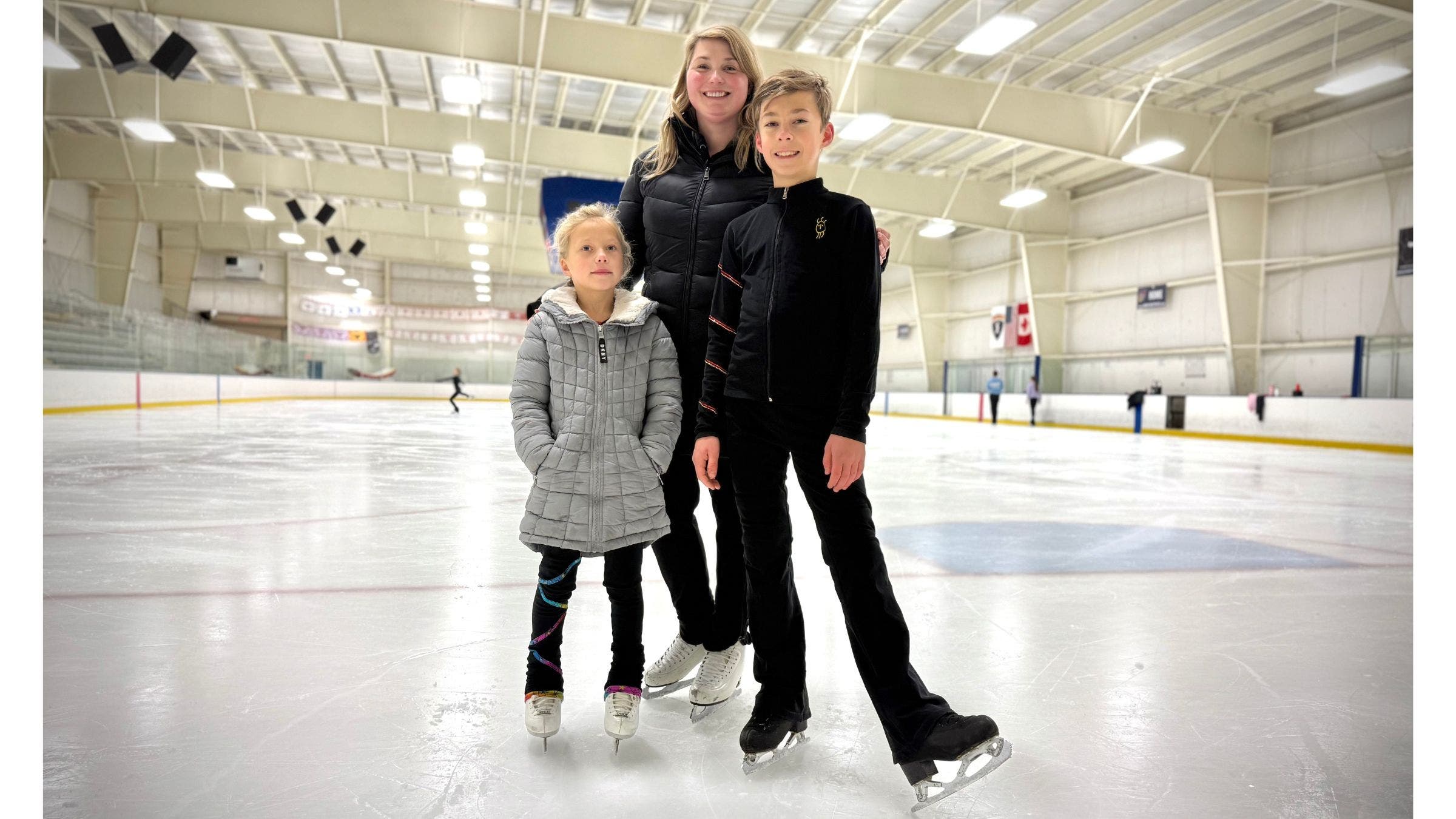 Constantine with his coach and little sister.