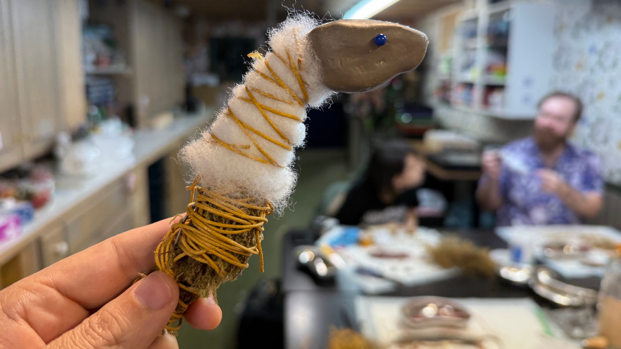 Part of Meatball's inner form, made with air dry clay, sphagnum moss wrapped in twine, and poly-fil