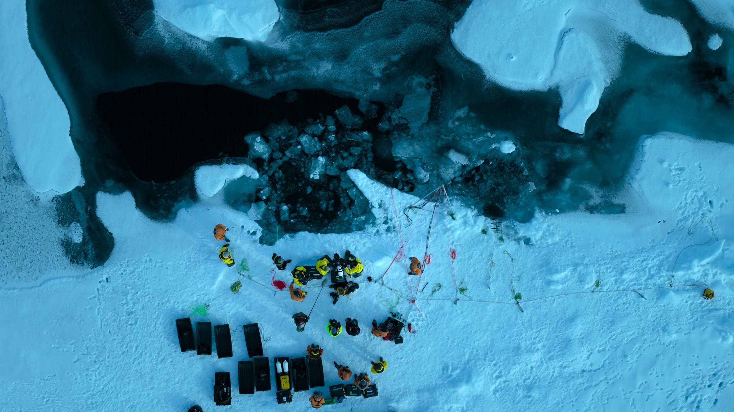 Will Smith and Expedition Leader Allison Fong prepare to dive under the Arctic Ice.