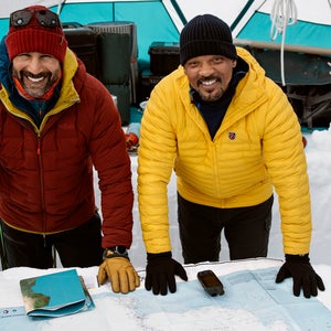 Richard Parks (left) and Will Smith (right) in a tent with maps in Antarctic for 'Pole to Pole'