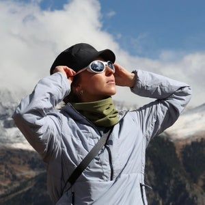 Photo of retro-inspired 90s sunglasses worn outdoors, capturing bold, throwback style and sporty attitude; photographed by Kellyn Wilson for a story by Lily Ritter.