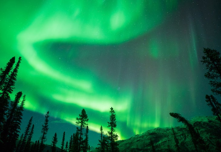 Aurora over Brooks Range at Arctic Hive in Wiseman Alaska