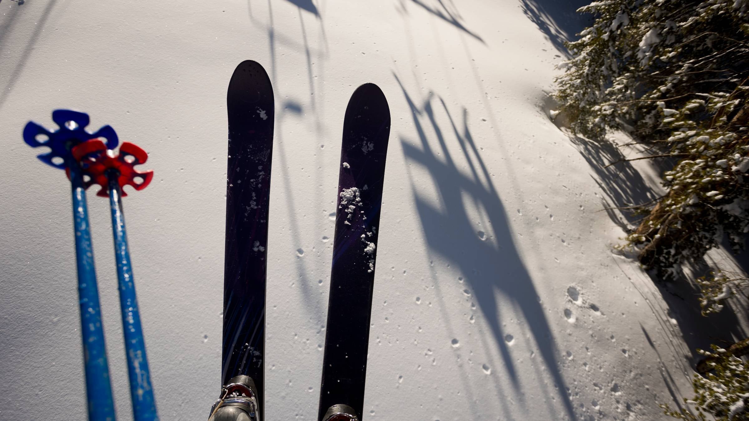 Skier riding a chair lift