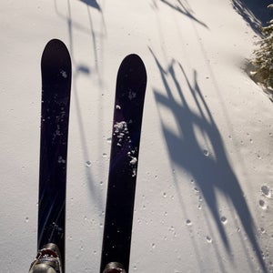 Skier riding a chair lift