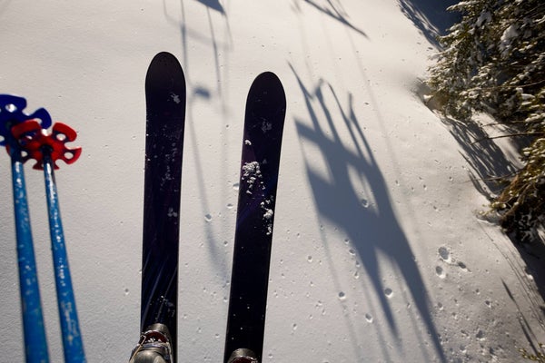Skier riding a chair lift