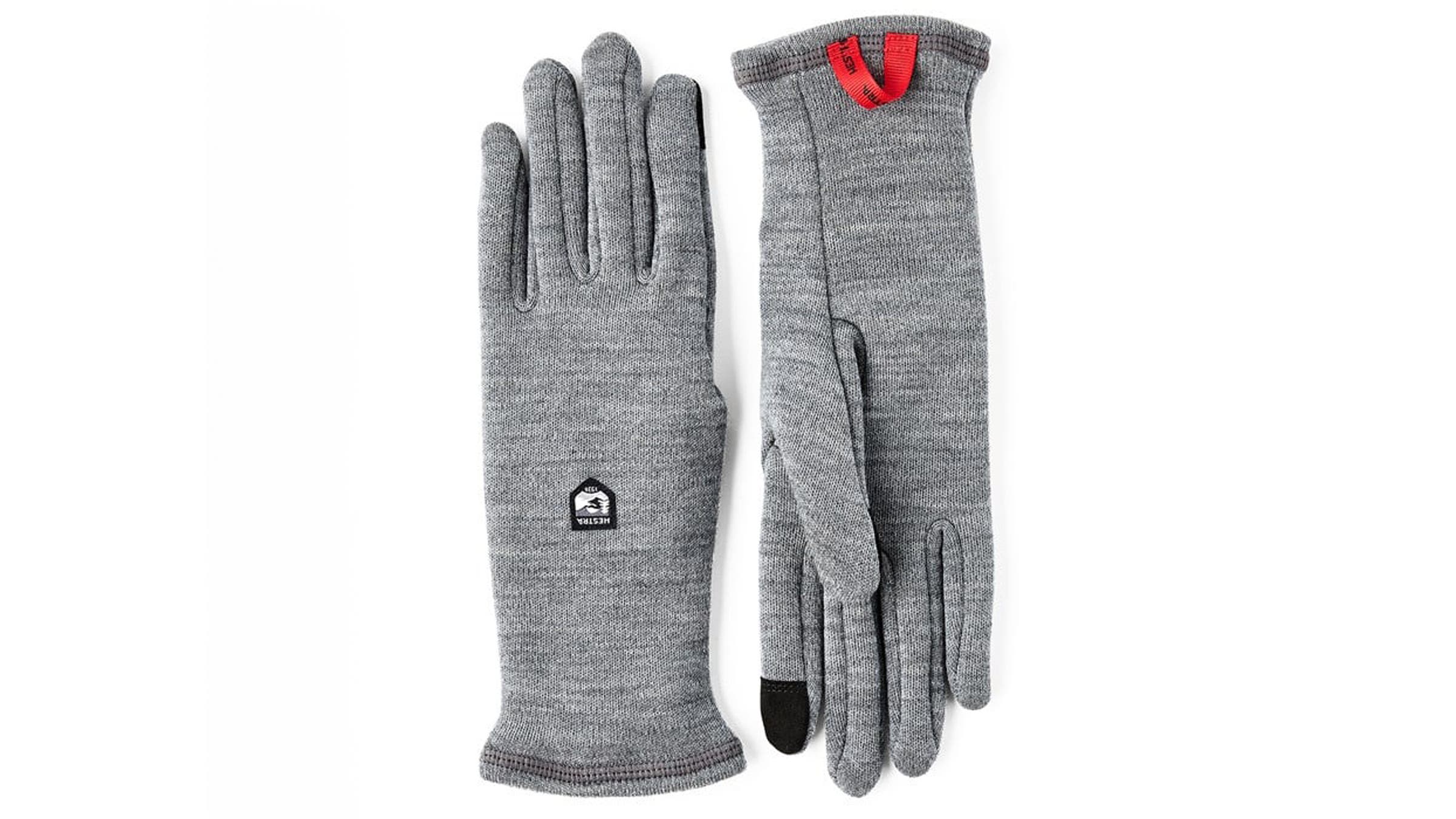 Hestra Gravita Merino glove liner grey on white background.