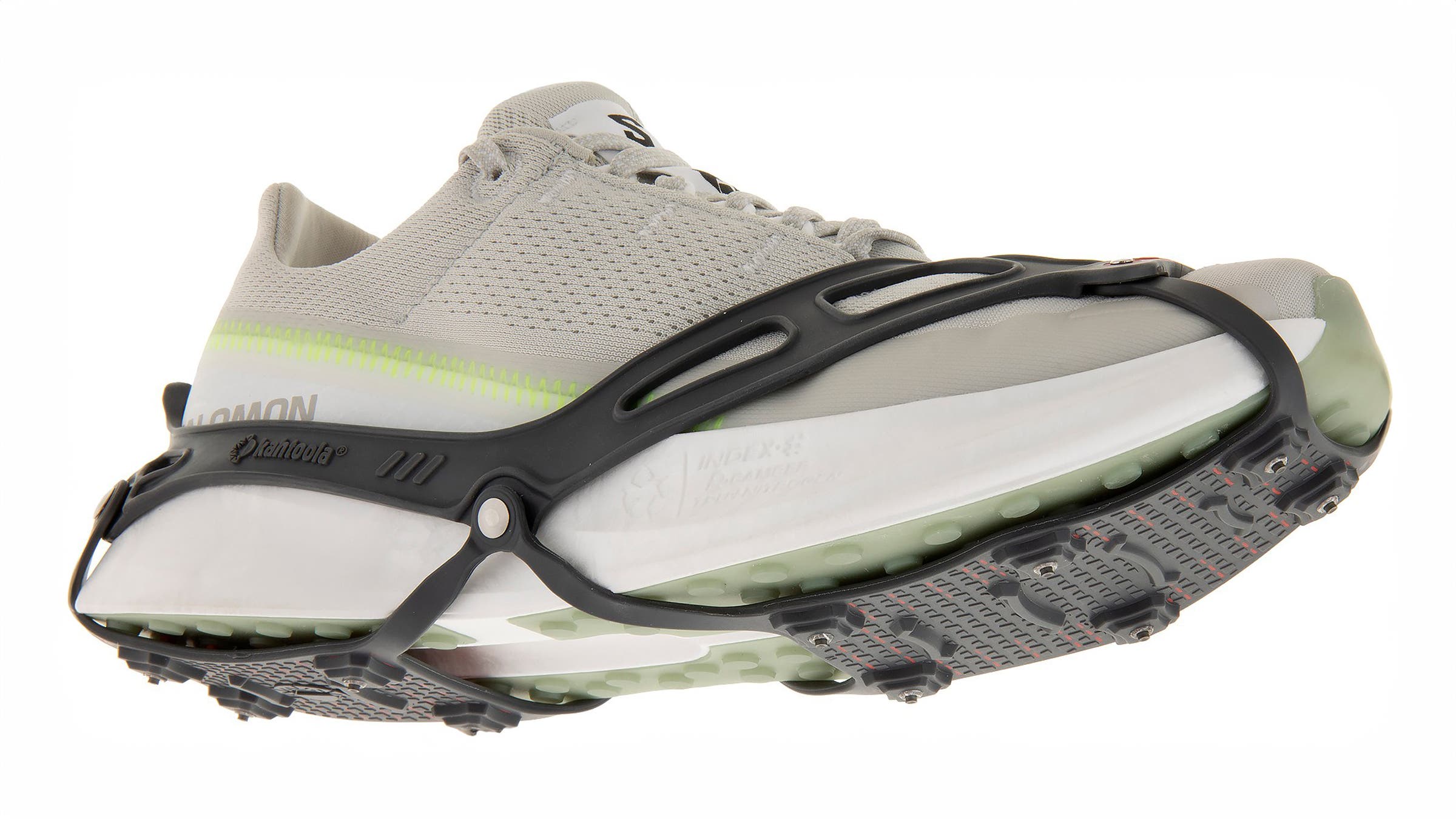 Kahtoola NANOspikes traction crampons for hiking on white background.