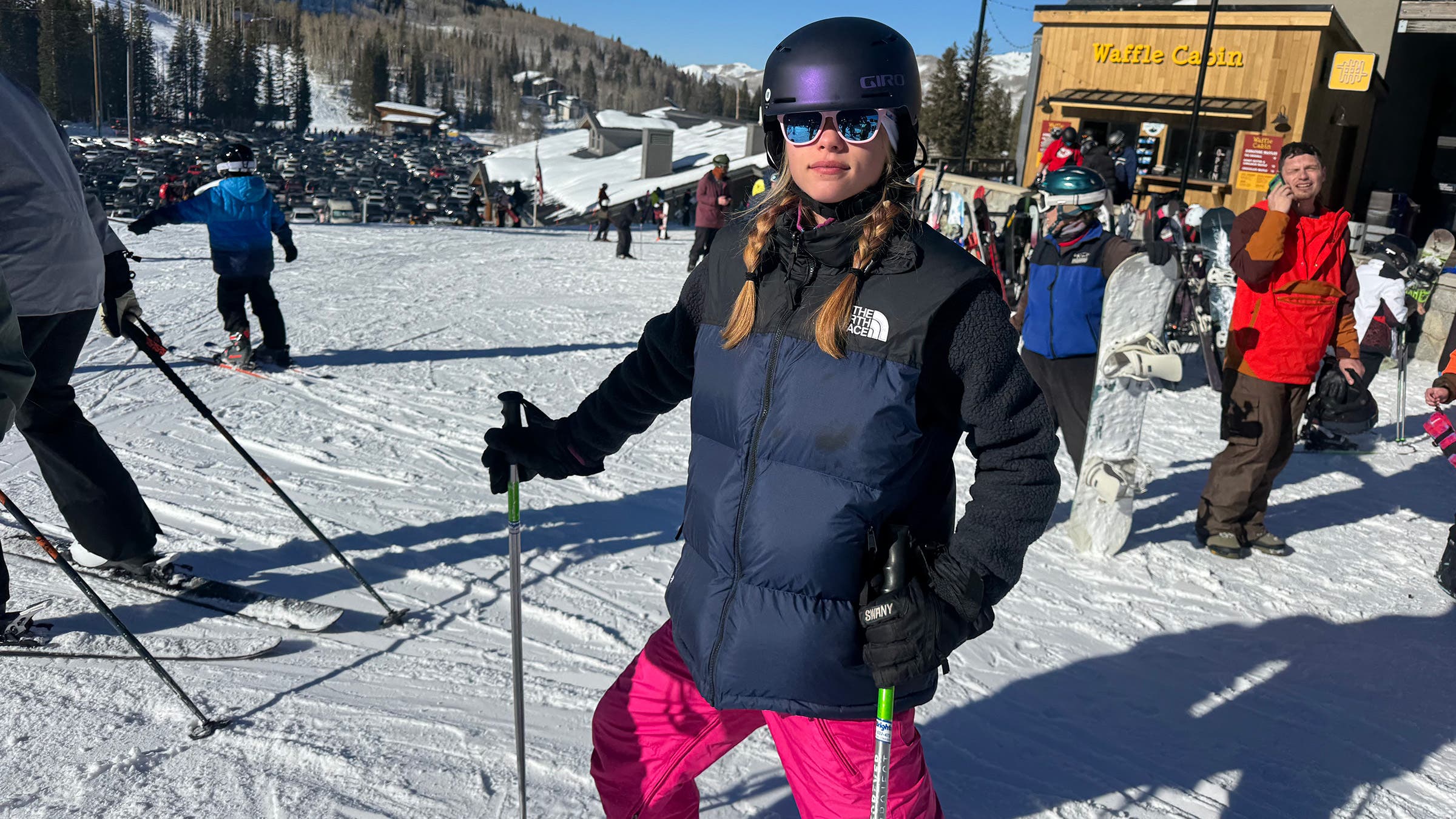 Skier wearing The North Face Nuptse vest 