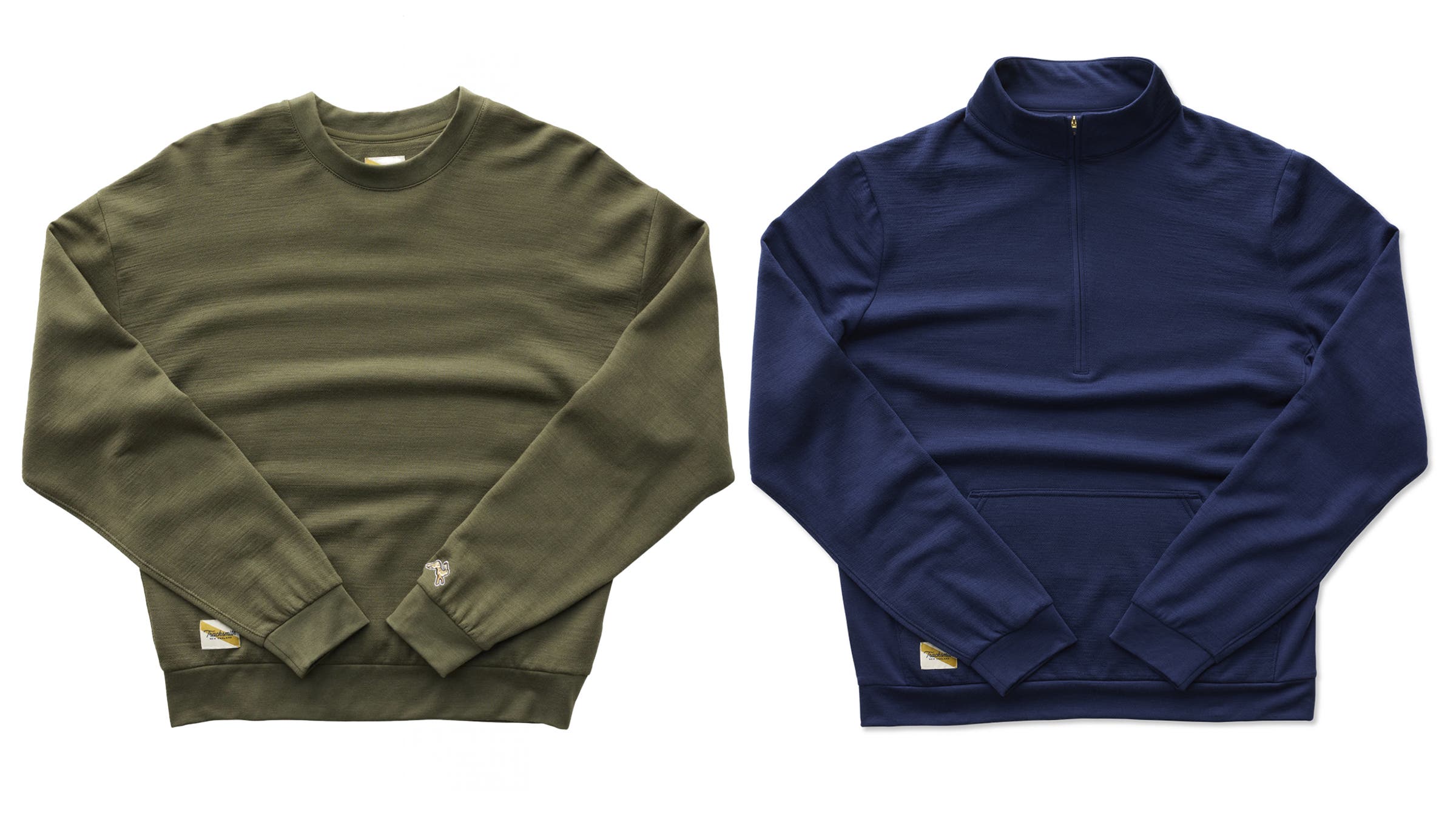 Tracksmith Downeaster Zipneck and Tracksmith Downeaster Crew green and navy blue running midlayers on white background