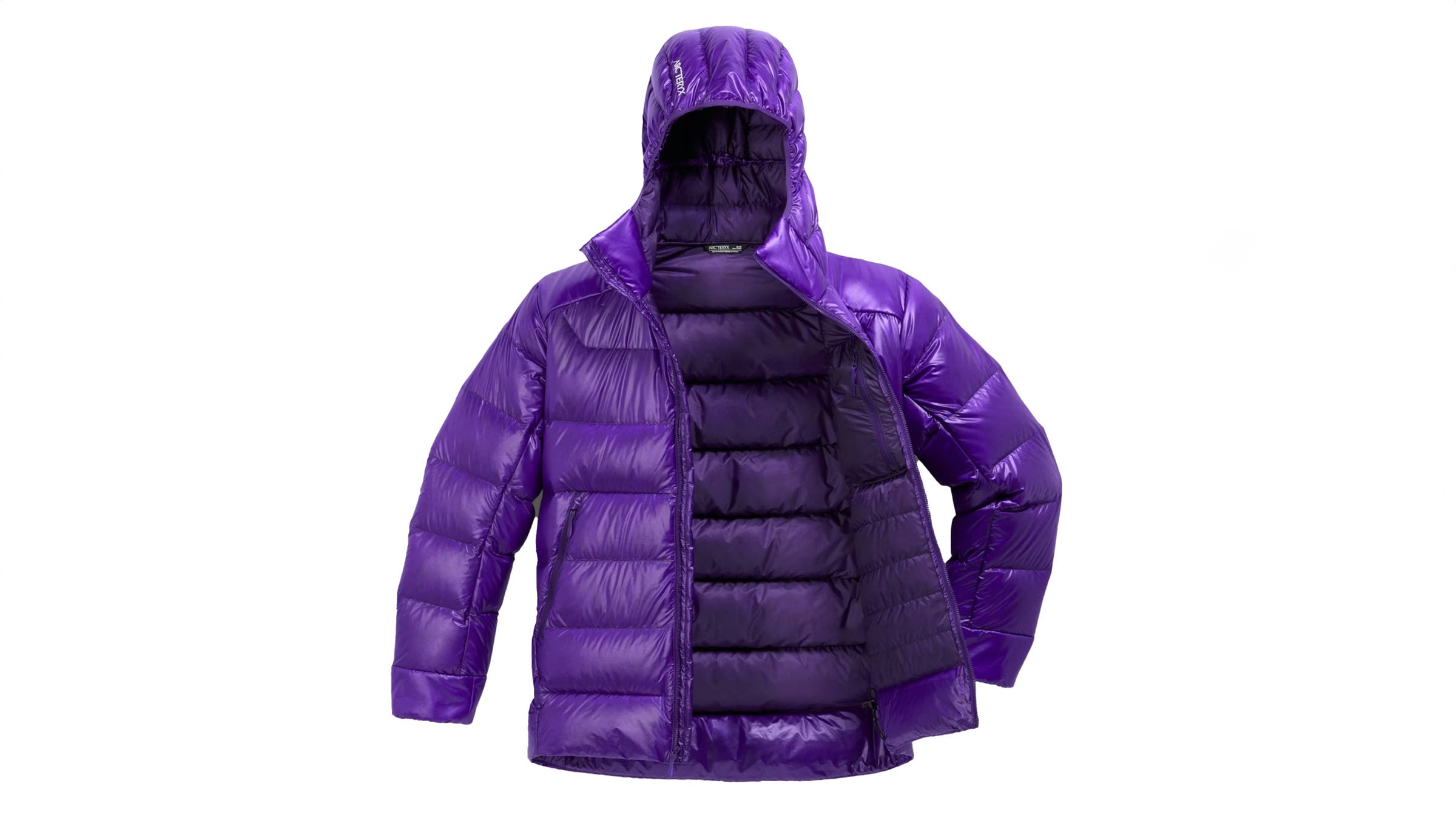 Arc'teryx Cerium SV purple down hooded jacket on white background.
