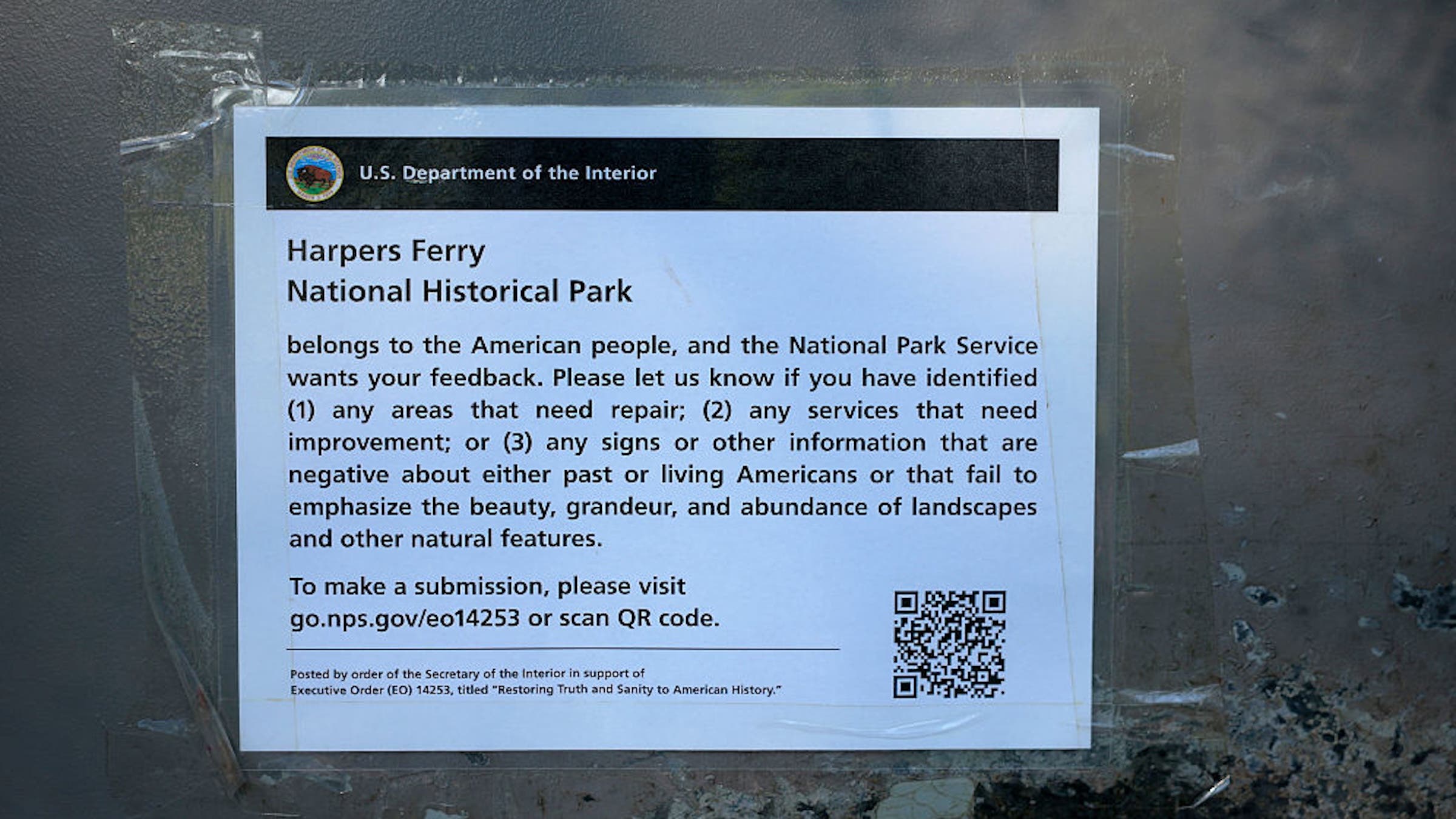 A sign is taped to the door of the restroom at the Antietam National Battlefield Visitors Center near Harpers Ferry