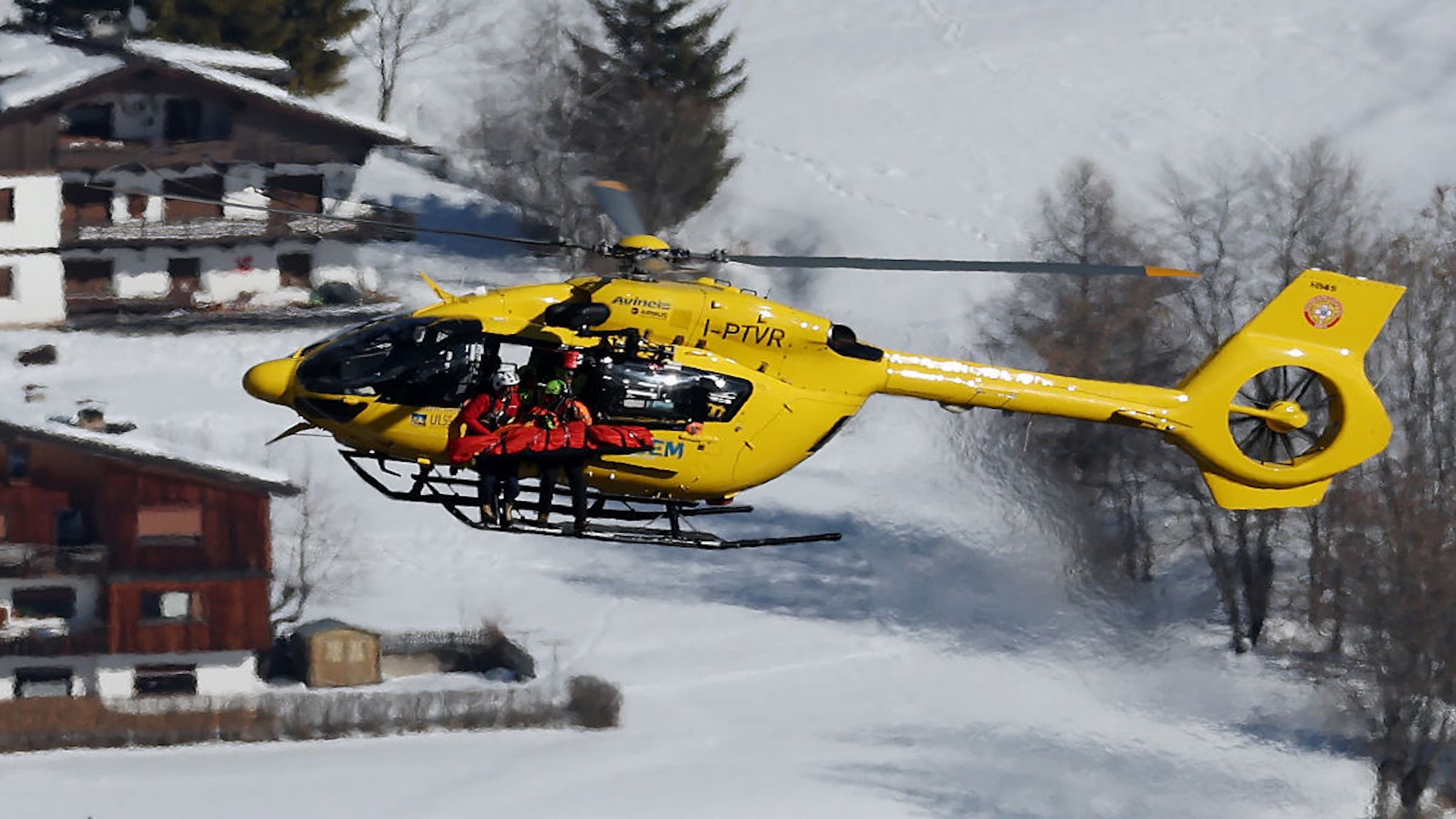 A mountain rescue helicopter is seen airlifting Vonn after her crash.
