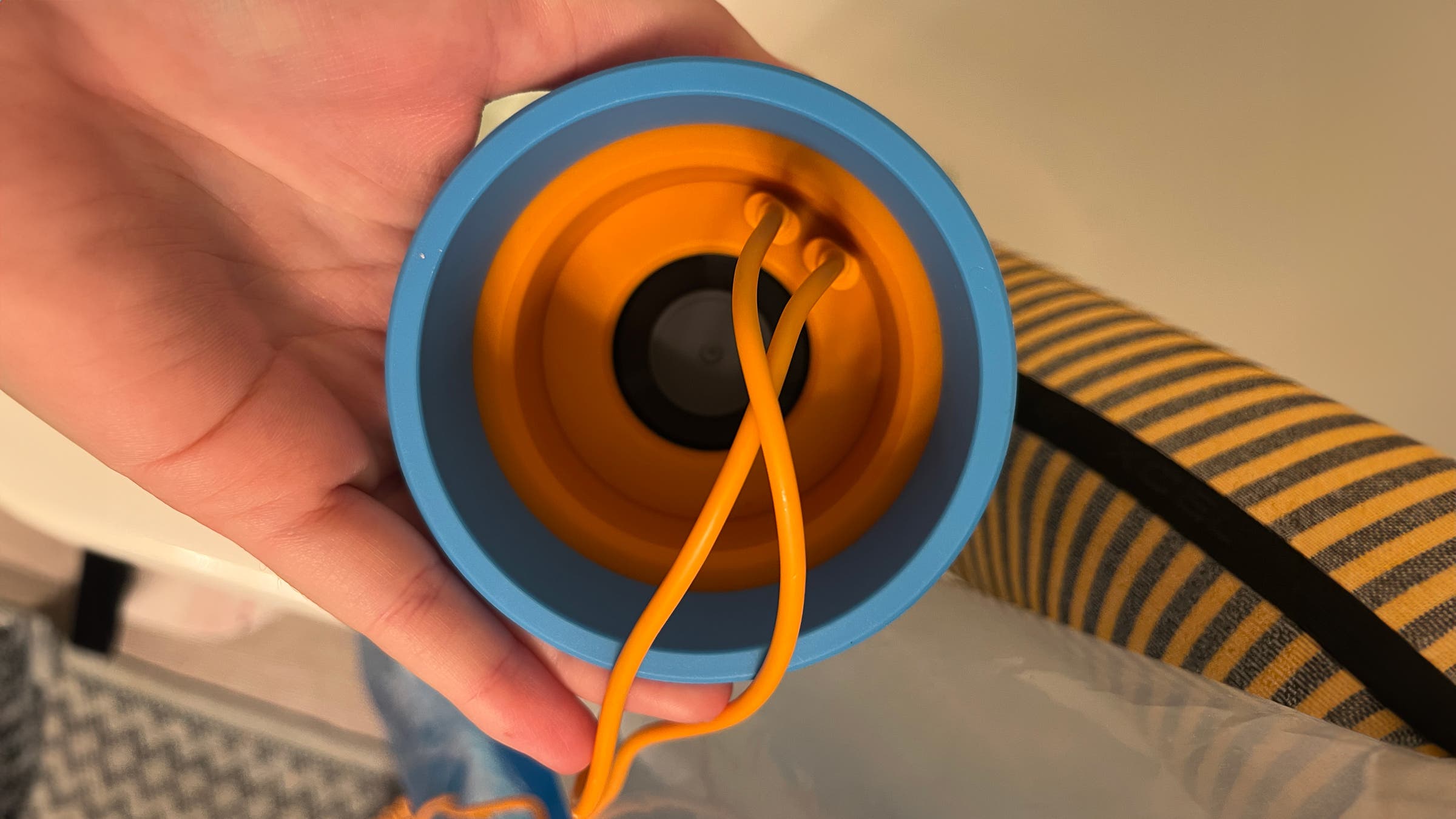 Close-up shot of bottom side of SurfDry wetsuit dryer