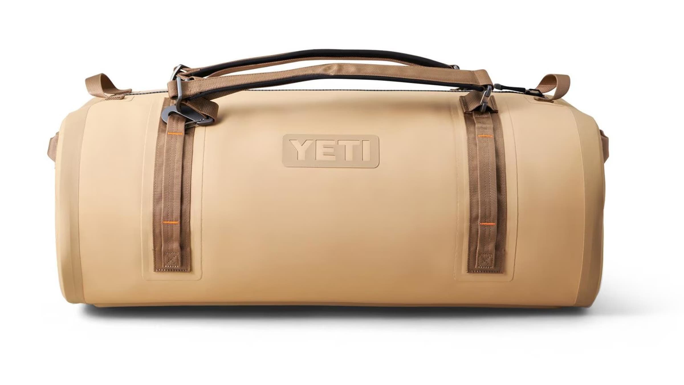 Yeti Panga waterproof duffel bag tan on white background.