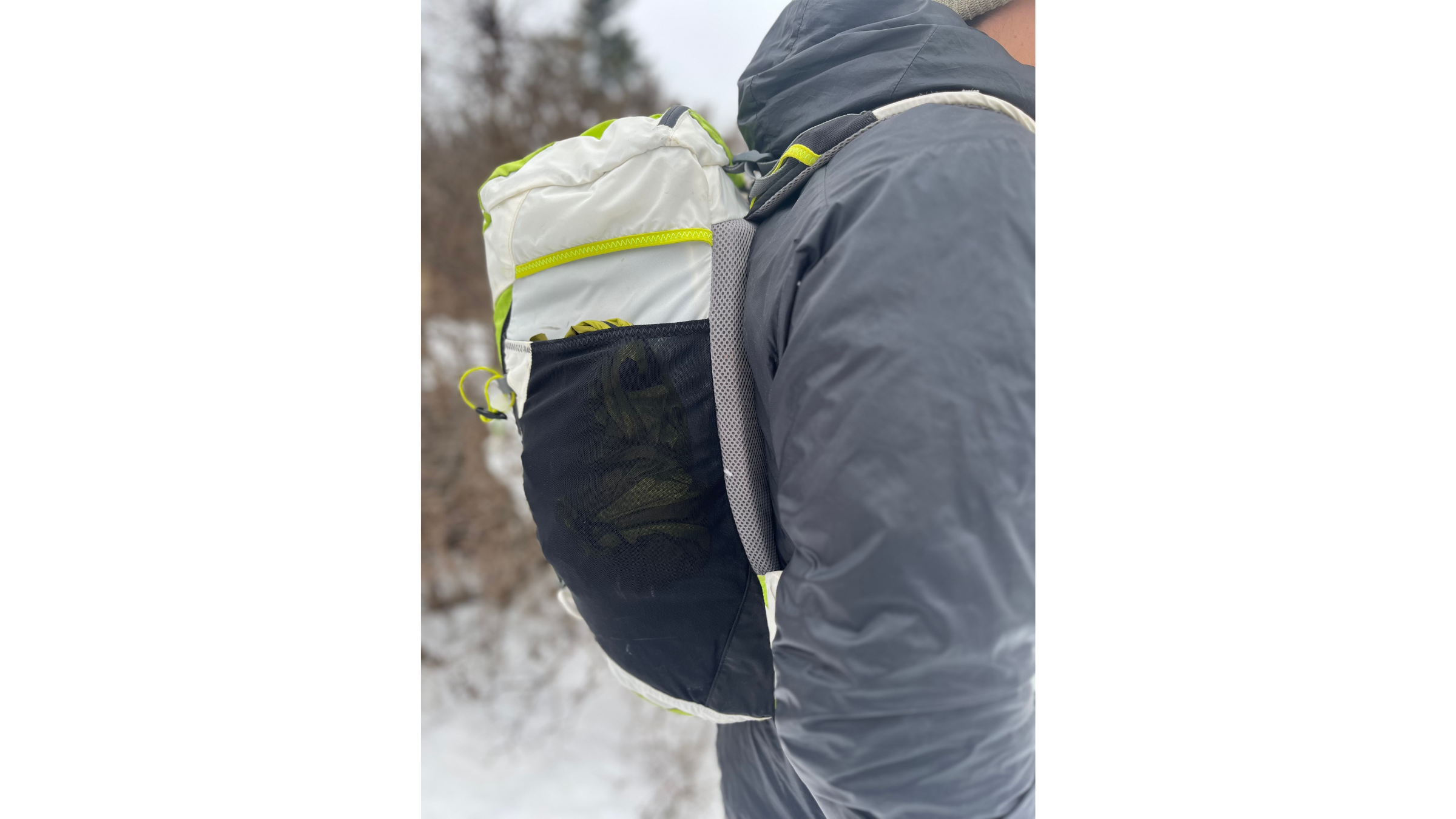 The X3 Backdoor's side profile shows off its high-volume mesh pockets and the convenient rear-entry zipper that makes digging through the top of your pack a thing of the past.