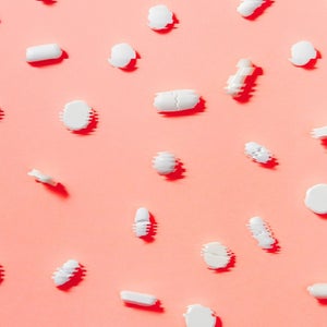 pills on a pink background