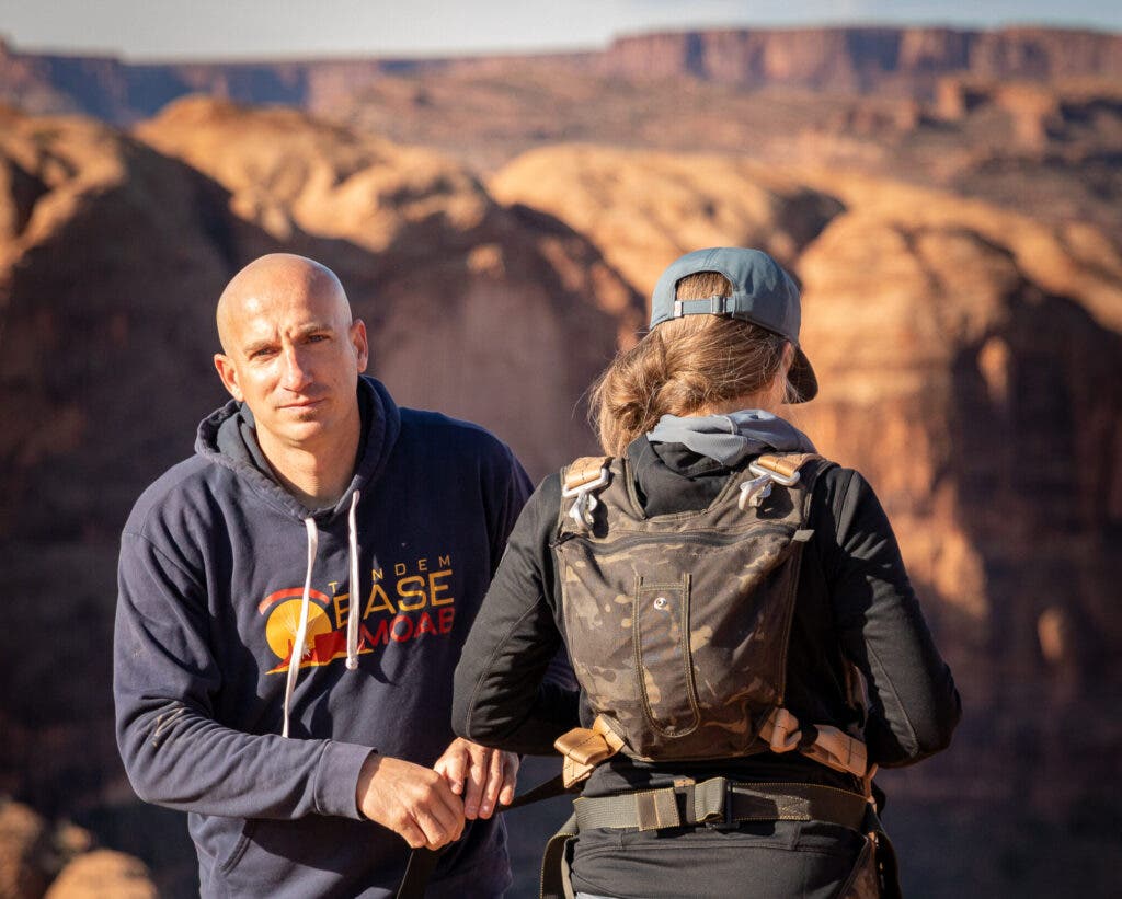 two people in red rock country