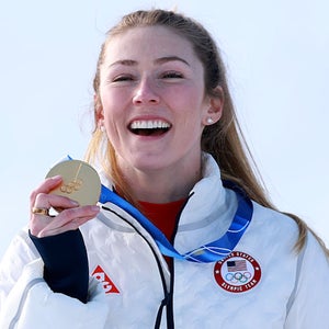 Gold medalist Mikaela Shiffrin of Team United States celebrates on the podium during the medal ceremony following the Women's Slalom Run on day twelve of the Milano Cortina 2026 Winter Olympics at Tofane Alpine Skiing Centre on February 18, 2026 in Cortina d'Ampezzo, Italy.