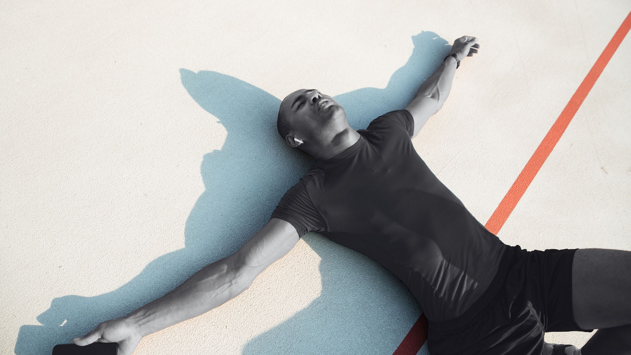 person on the floor tired after a workout